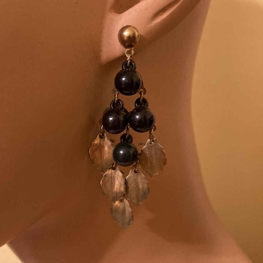 Gold tone leaf and black beaded cluster earrings
